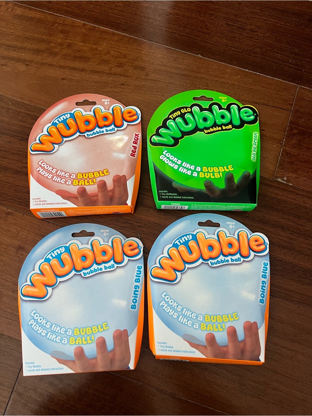 Lot of 4 Tiny Wubble Bubble Ball Assortment - Blue, Green, Red